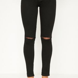 PrettyLittleThing black knee rip high-waisted skinny jeans size 12 & 14
